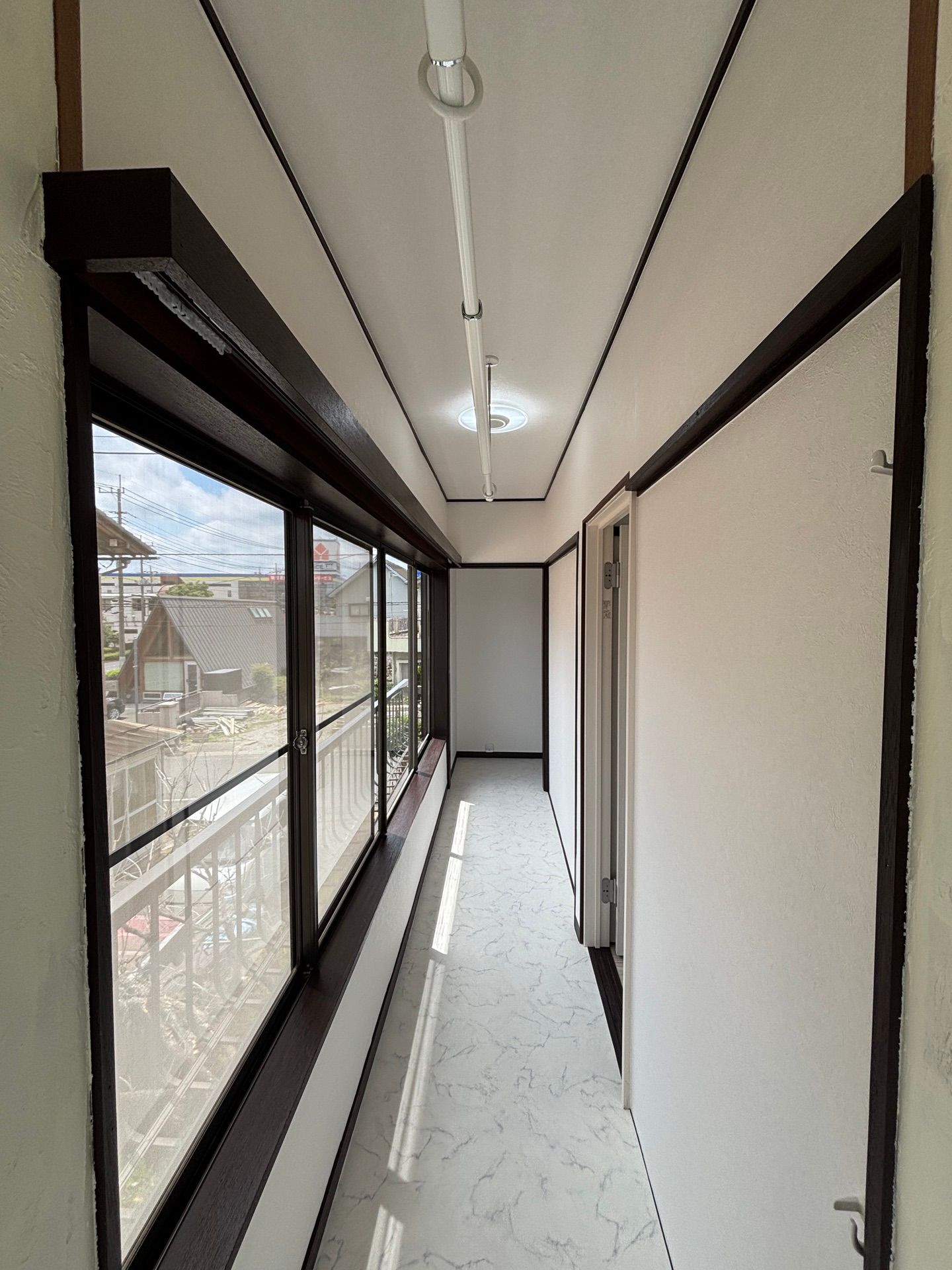 玄関吹き抜けと屋根裏収納がある家（After（再生後） 写真4）